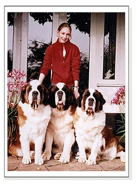 three champion dogs and girl